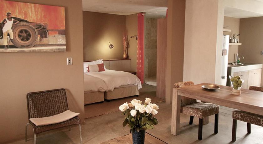 Imagen de la habitación del Hotel The Village Courtyard Suites. Foto 4
