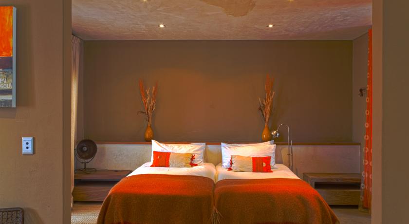Imagen de la habitación del Hotel The Village Courtyard Suites. Foto 5