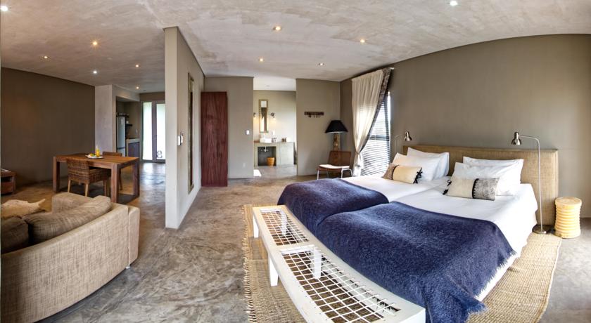 Imagen de la habitación del Hotel The Village Courtyard Suites. Foto 6