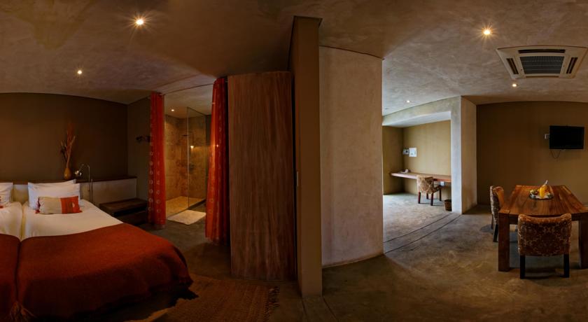 Imagen de la habitación del Hotel The Village Courtyard Suites. Foto 8