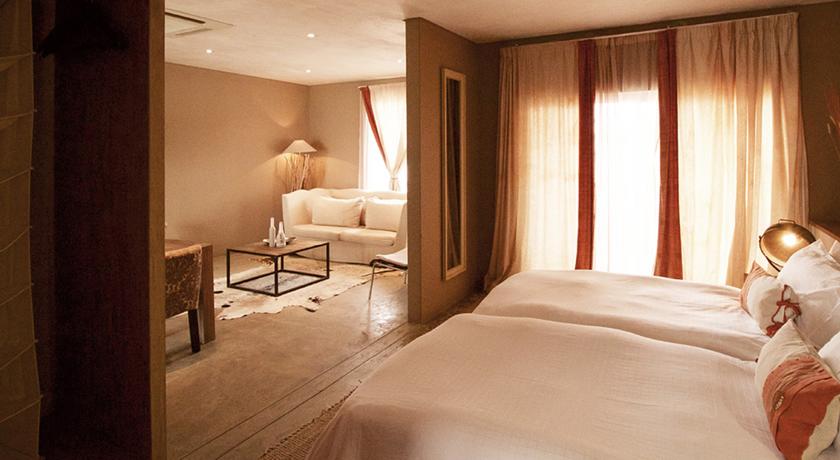 Imagen de la habitación del Hotel The Village Courtyard Suites. Foto 10