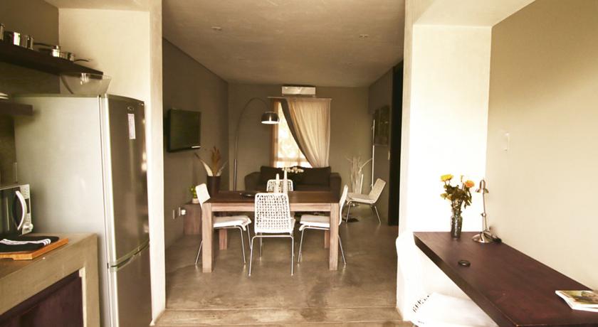 Imagen de la habitación del Hotel The Village Courtyard Suites. Foto 11