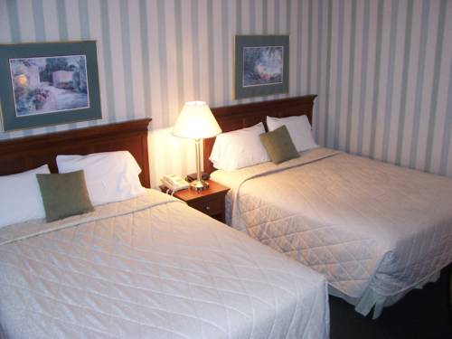 Imagen de la habitación del Hotel The Village Inn Harrisonburg. Foto 4