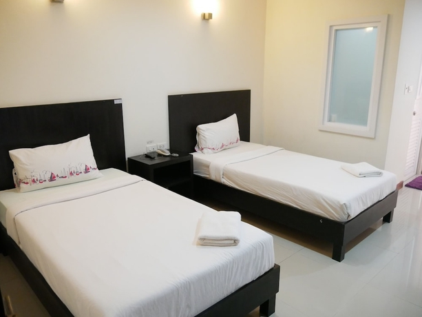 Imagen de la habitación del Hotel The Village Phitsanulok. Foto 3