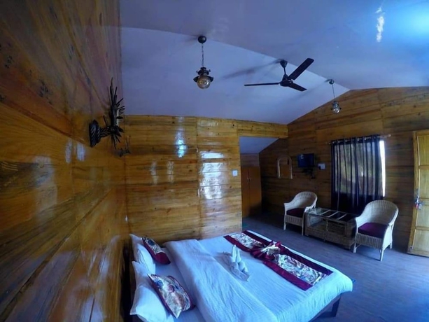 Imagen de la habitación del Hotel The Village Retreat Resort. Foto 7