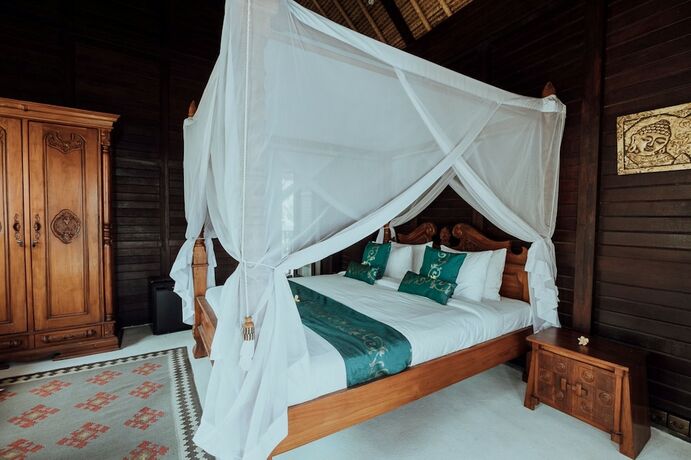 Imagen de la habitación del Hotel The Village of Angels. Foto 13