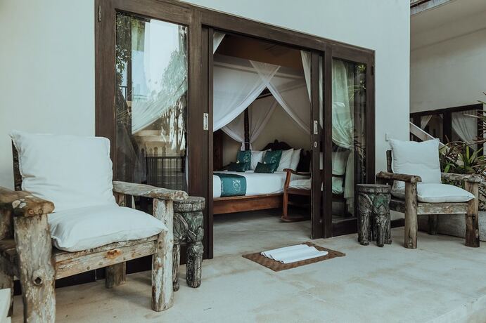 Imagen de la habitación del Hotel The Village of Angels. Foto 16