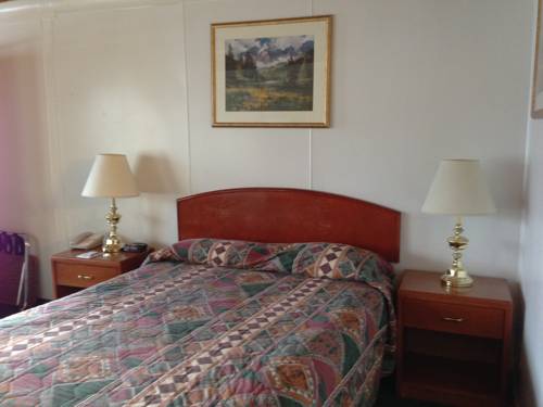 Imagen de la habitación del Hotel The Villager Inn. Foto 10