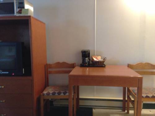 Imagen de la habitación del Hotel The Villager Inn. Foto 16