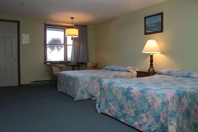 Imagen de la habitación del Hotel The Villager Motel. Foto 11