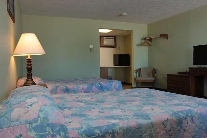 Imagen de la habitación del Hotel The Villager Motel. Foto 13