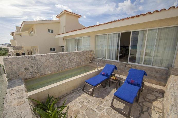 Imagen de la habitación del Hotel The Villas Cancun by Grand Park Royal. Foto 6