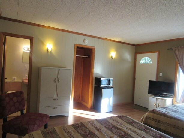 Imagen de la habitación del Hotel The Villas on Lake George. Foto 17