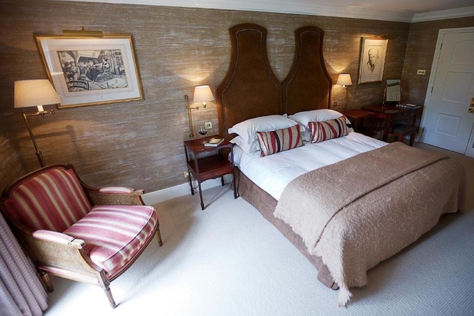 Imagen de la habitación del Hotel The Vineyard. Foto 17