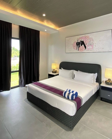 Imagen de la habitación del Hotel The Vineyard at Tanauan. Foto 14