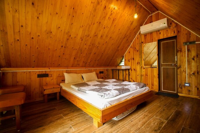 Imagen de la habitación del Hotel The Vintage Farm. Foto 22