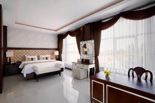 Imagen de la habitación del Hotel The Visala Boutique Suites Seminyak. Foto 8