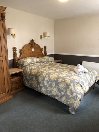 Imagen de la habitación del Hotel The Waggon and Horses. Foto 9