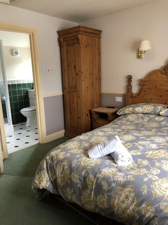 Imagen de la habitación del Hotel The Waggon and Horses. Foto 11