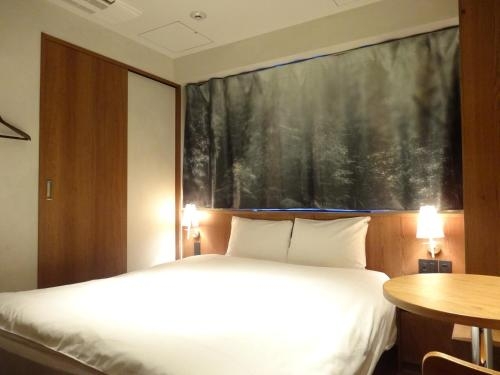 Imagen de la habitación del Hotel The Wall. Foto 8