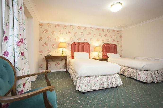 Imagen de la habitación del Hotel The Walnut Tree. Foto 8