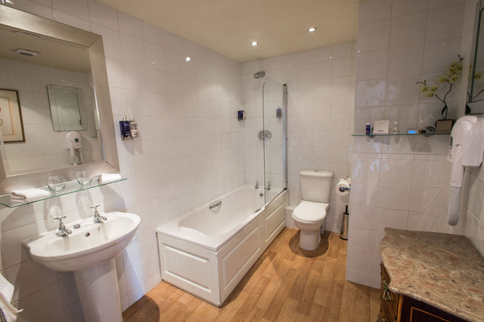 Imagen de la habitación del Hotel The Walton. Foto 2