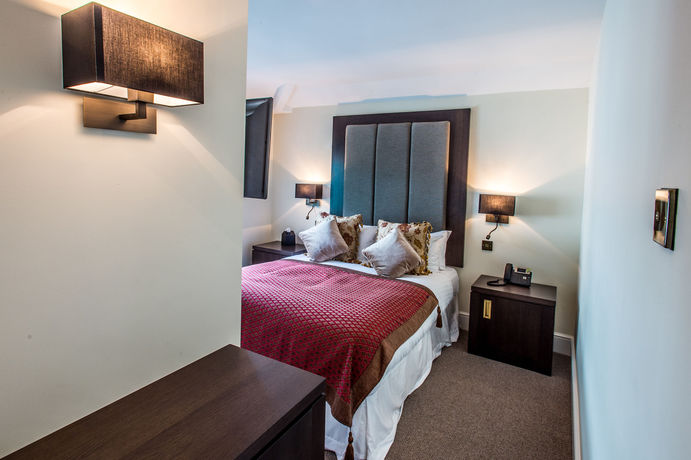 Imagen de la habitación del Hotel The Walton. Foto 4