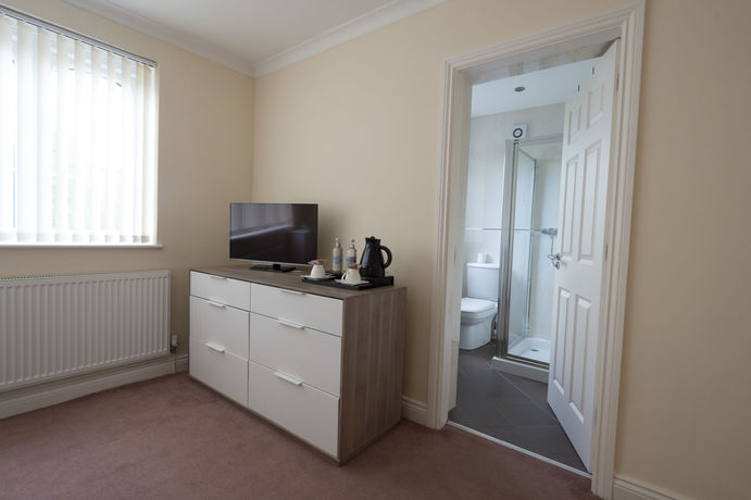 Imagen de la habitación del Hotel The Walton. Foto 6