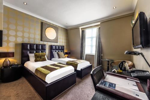 Imagen de la habitación del Hotel The Washington Mayfair Hotel. Foto 12