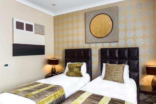 Imagen de la habitación del Hotel The Washington Mayfair Hotel. Foto 13