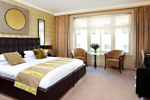 Imagen de la habitación del Hotel The Washington Mayfair Hotel. Foto 16