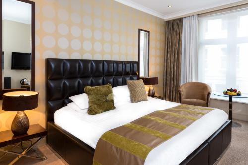 Imagen de la habitación del Hotel The Washington Mayfair Hotel. Foto 17