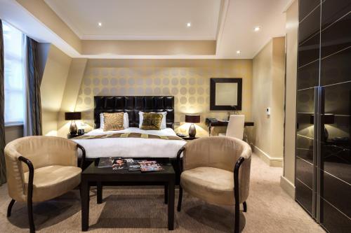 Imagen de la habitación del Hotel The Washington Mayfair Hotel. Foto 19