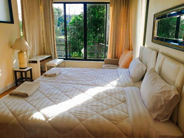 Imagen de la habitación del Hotel The Waterfall. Foto 3