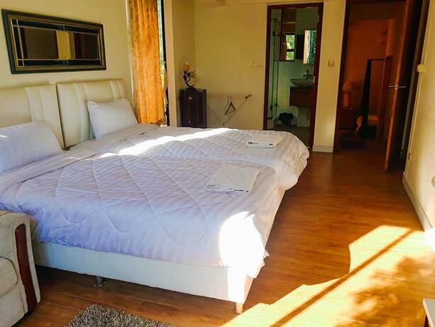 Imagen de la habitación del Hotel The Waterfall. Foto 6