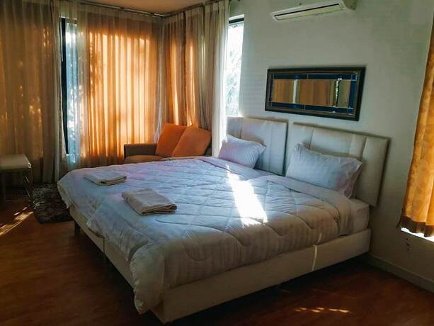 Imagen de la habitación del Hotel The Waterfall. Foto 7