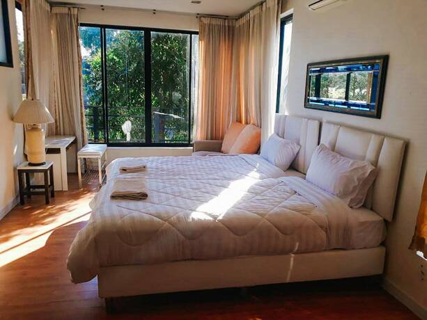 Imagen de la habitación del Hotel The Waterfall. Foto 8