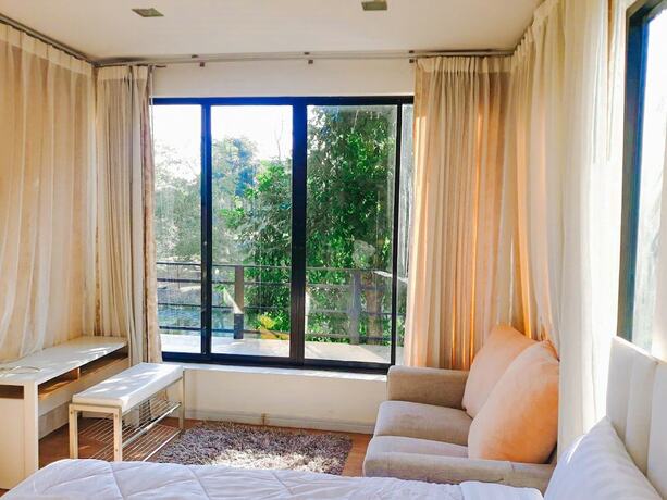 Imagen de la habitación del Hotel The Waterfall. Foto 14