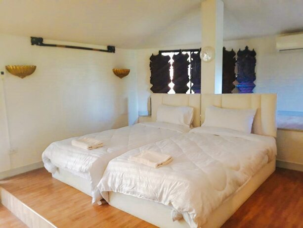 Imagen de la habitación del Hotel The Waterfall. Foto 17