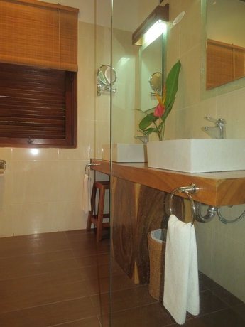 Imagen de la habitación del Hotel The Watergarden. Foto 7
