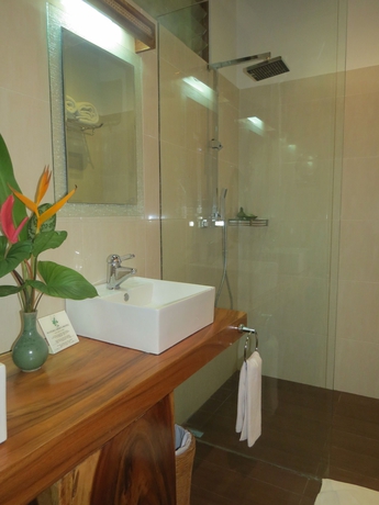 Imagen de la habitación del Hotel The Watergarden. Foto 9