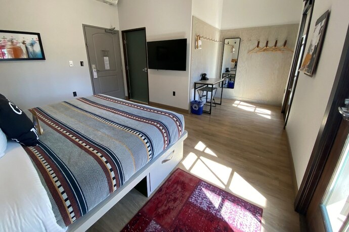 Imagen de la habitación del Hotel The Waterman. Foto 17
