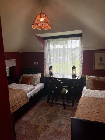 Imagen de la habitación del Hotel The Waters Country House. Foto 17