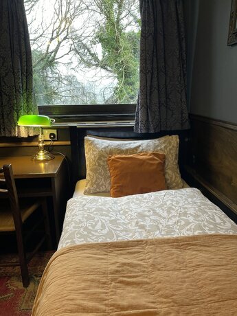 Imagen de la habitación del Hotel The Waters Country House. Foto 19