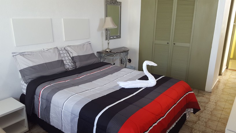 Imagen de la habitación del Hotel The Wave. Foto 16