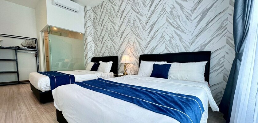 Imagen de la habitación del Hotel The Wave Residence. Foto 11