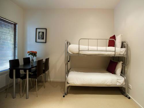 Imagen de la habitación del Hotel The Waves Apartments. Foto 4