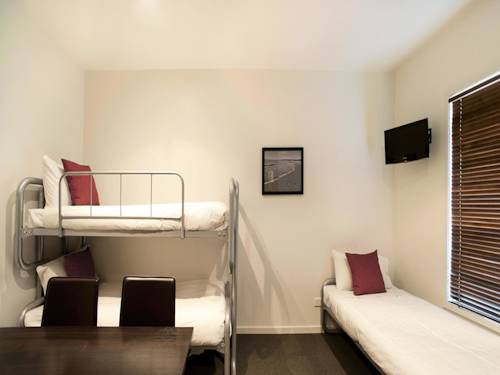 Imagen de la habitación del Hotel The Waves Apartments. Foto 5