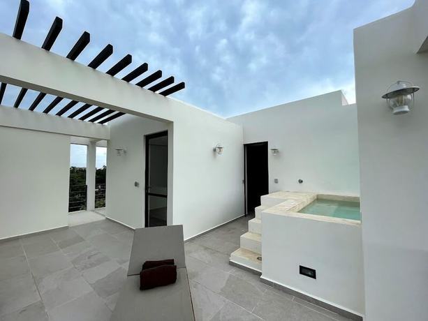 Imagen de la habitación del Hotel The Waves Tulum. Foto 10