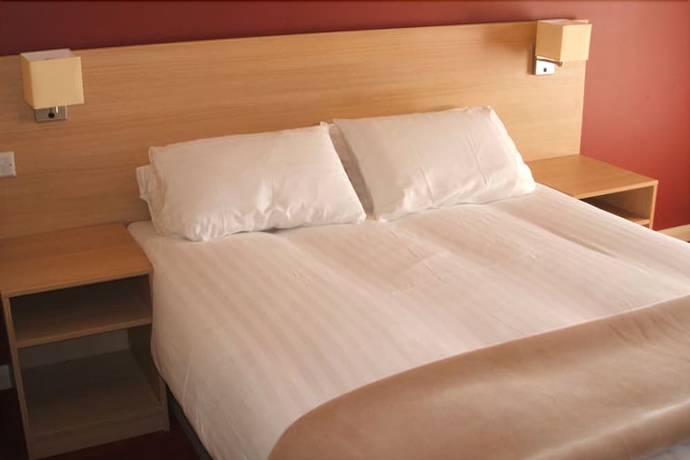 Imagen de la habitación del Hotel The Welcome Inn. Foto 7